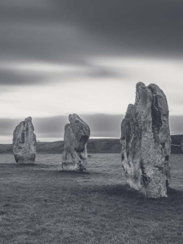 walks around the stone circle in Avebury